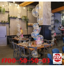 קישוט בלונים לאירוע דמויות בשילוב עיצוב בועות